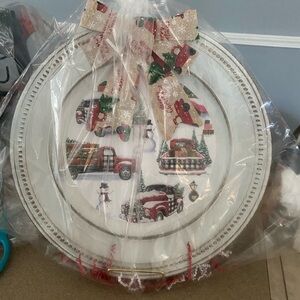 Festive Holiday Decorative Plate with Red Trucks